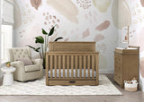 Delta Children Simmons Kids Caden 6-in-1 Convertible Crib with Trundle Drawer,  Rustic Acorn